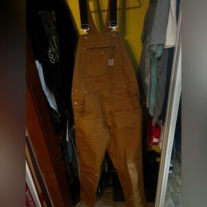 Carhartt bibs in good condition worn no more than 5 times. 36x34 khaki color